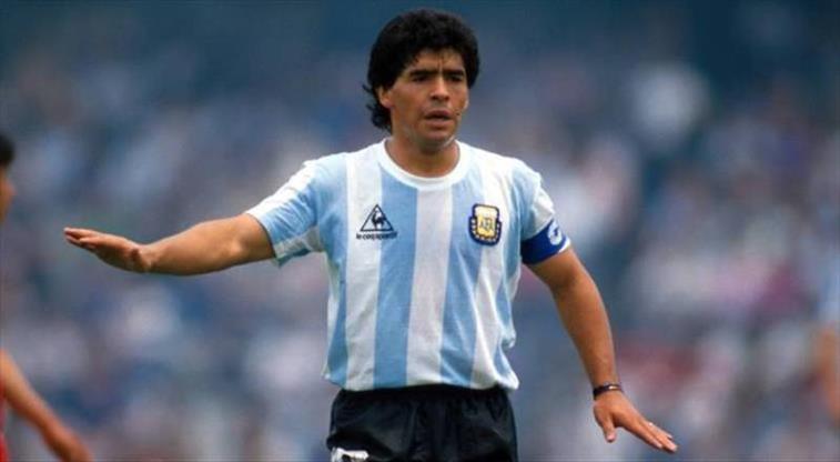Diego Maradona controlling the ball in inspirational pose