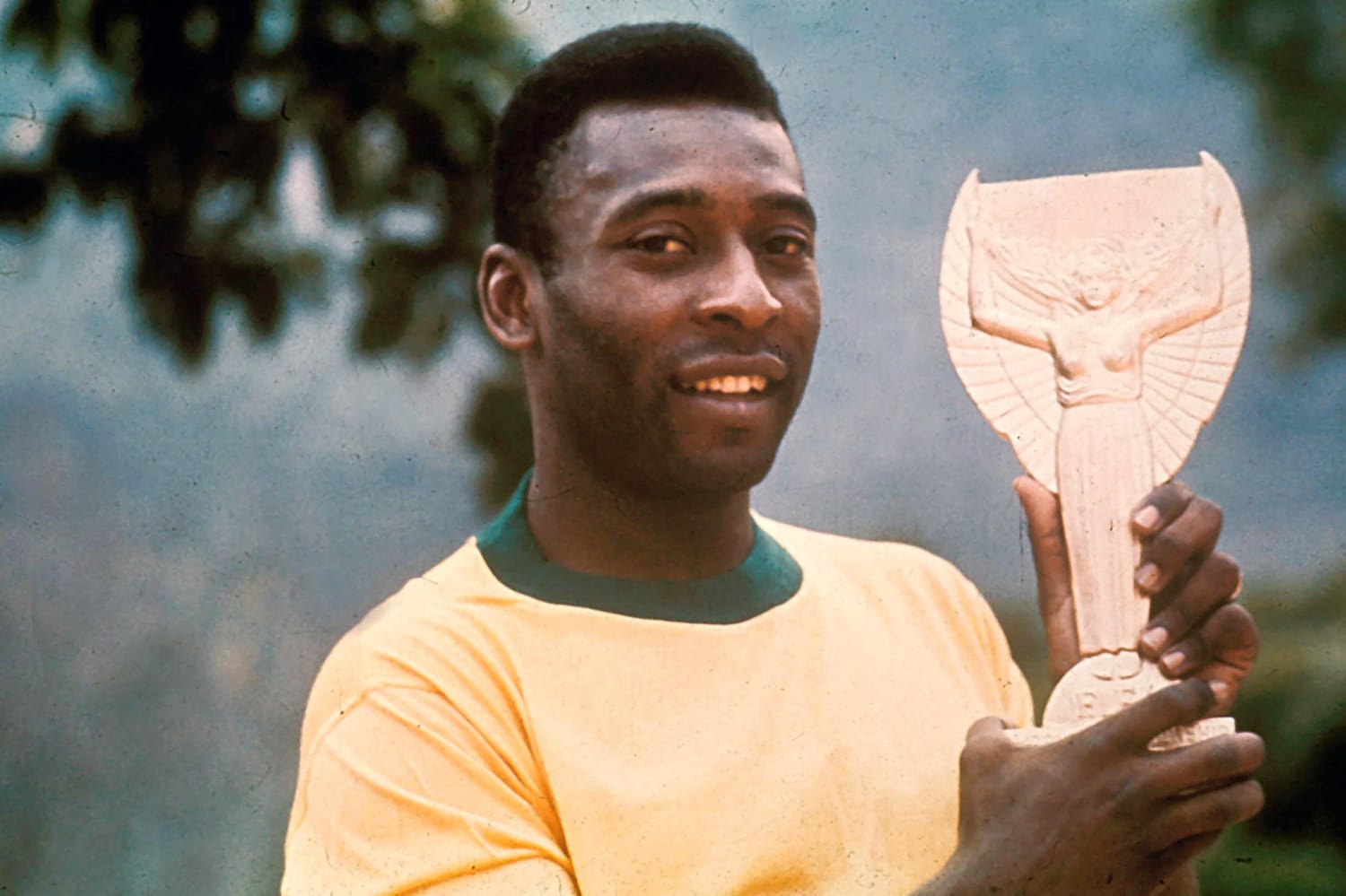 Pelé celebrating with an iconic pose