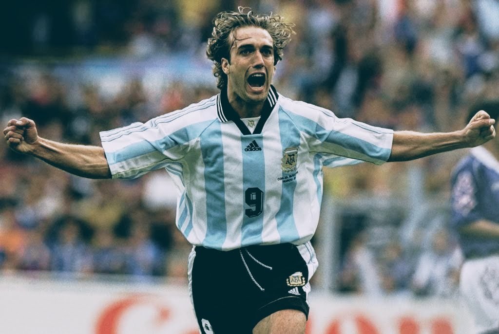 Gabriel Batistuta in Argentina shirt, powerful striker portrait
