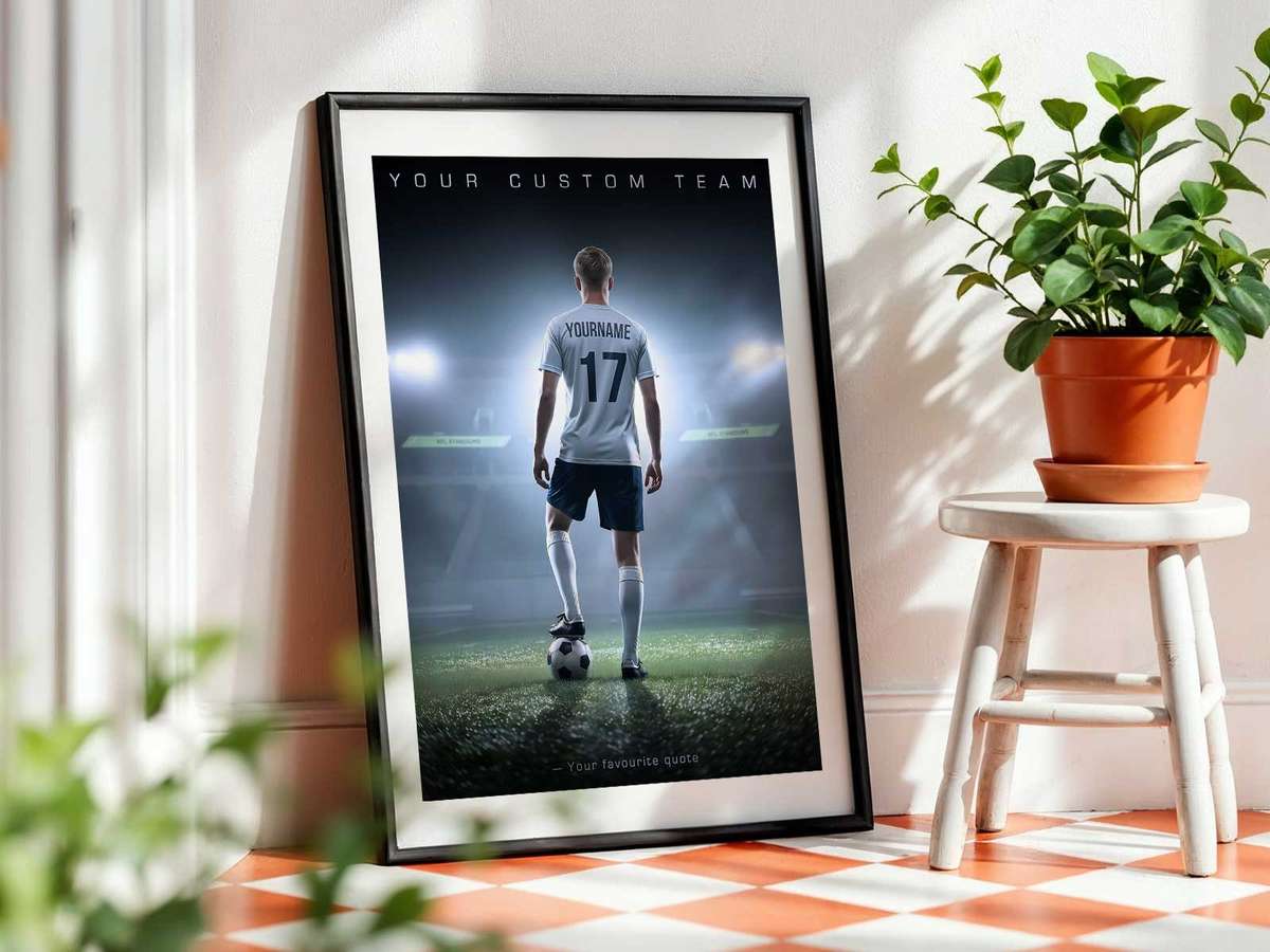 Minimalist soccer art poster featuring abstract silhouettes and muted colors mounted on a living room wall